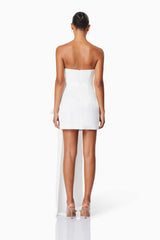 model wearing Alice Bow Strapless Mini Dress In White back shot