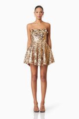 model wearing Alisha Strapless Fit & Flare Mini Dress In Gold front shot