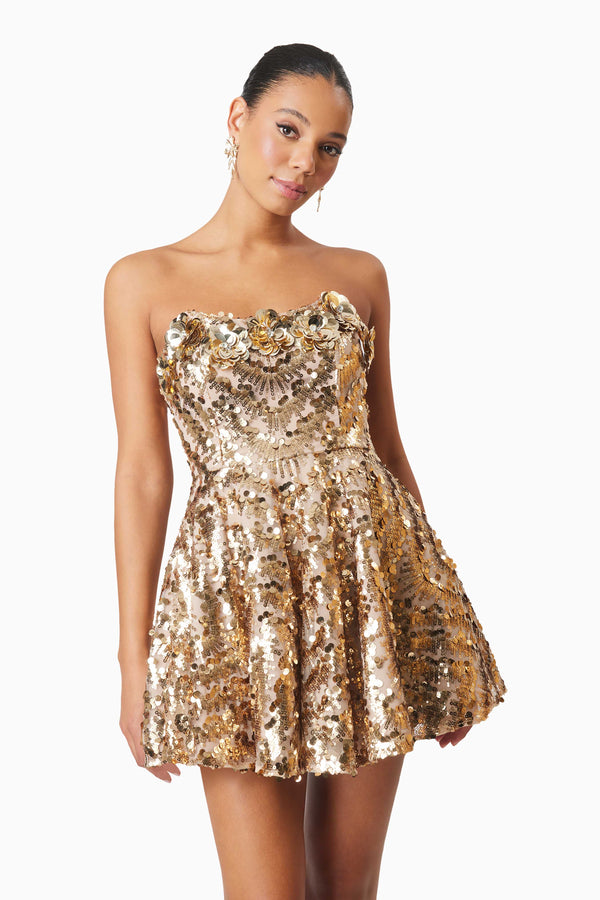 model wearing Alisha Strapless Fit & Flare Mini Dress In Gold front shot