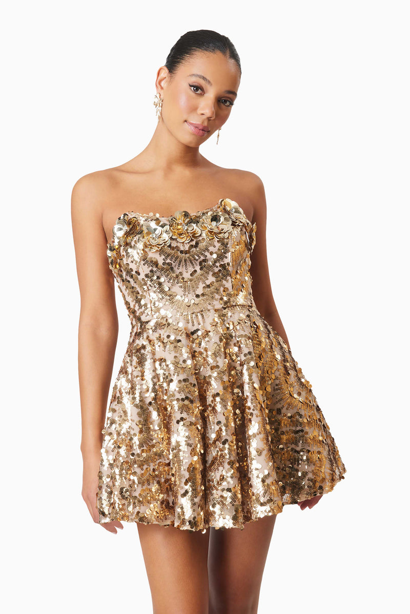 model wearing Alisha Strapless Fit & Flare Mini Dress In Gold front shot