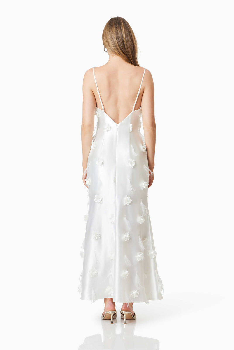 model wearing Lunaria Satin Maxi Dress In White back shot