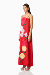 Brunette model wearing Buttercup Embroidered Maxi Dress In Red side shot