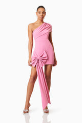 Brunette model wearing Jamie One Shoulder Mini Bow Dress In Pink posed shot