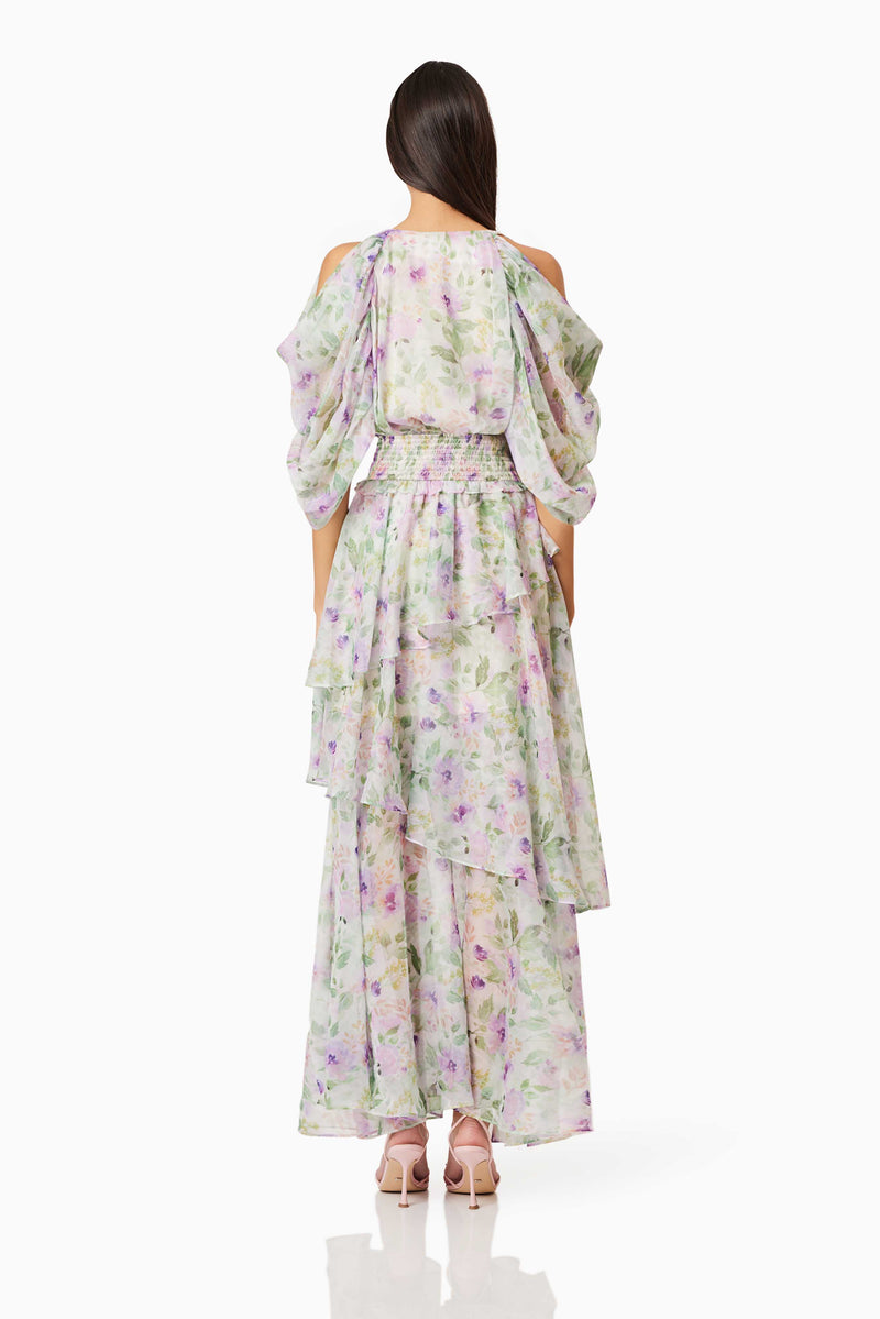 Brunette model wearing Mirabelle Draped Sleeve Maxi Dress In Floral back shot