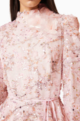 Brunette model wearing Regina Long Sleeve Dress in Pink close up detail shot