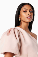 model wearing STARFIRE ONE SHOULDER MIDI DRESS IN PINK close up
