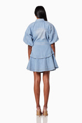 model wearing ART COLLARED MINI DRESS IN BLUE back shot