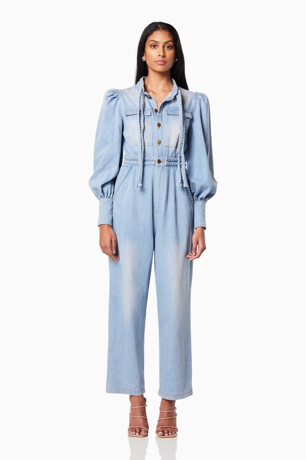 model wearing COUNTRY LONG SLEEVED JUMPSUIT IN BLUE front shot
