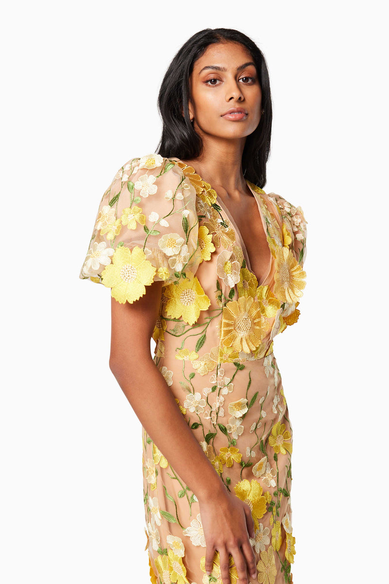 model wearing INDIE 3D FLORAL MIDI DRESS IN YELLOW close up shot