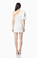 model wearing MARSEILLES 3D BOW MINI DRESS IN WHITE back shot