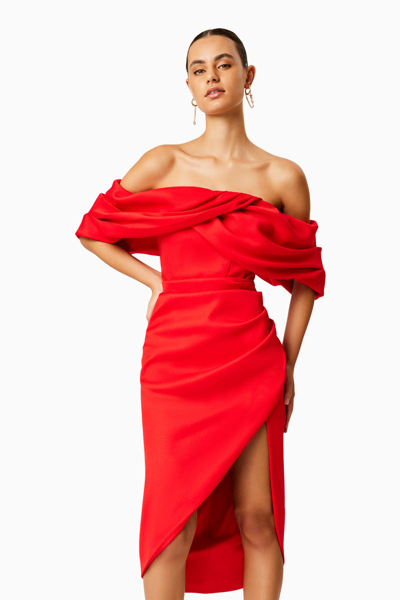 Brunette model wearing MARCH OFF THE SHOULDER MIDI DRESS IN RED close up shot