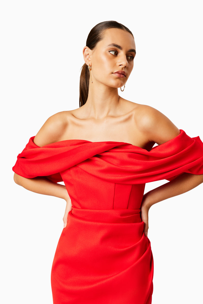 Brunette model wearing MARCH OFF THE SHOULDER MIDI DRESS IN RED close up shot