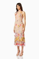 Brunette model wearing LARK FLORAL MIDI DRESS in MULTI side shot