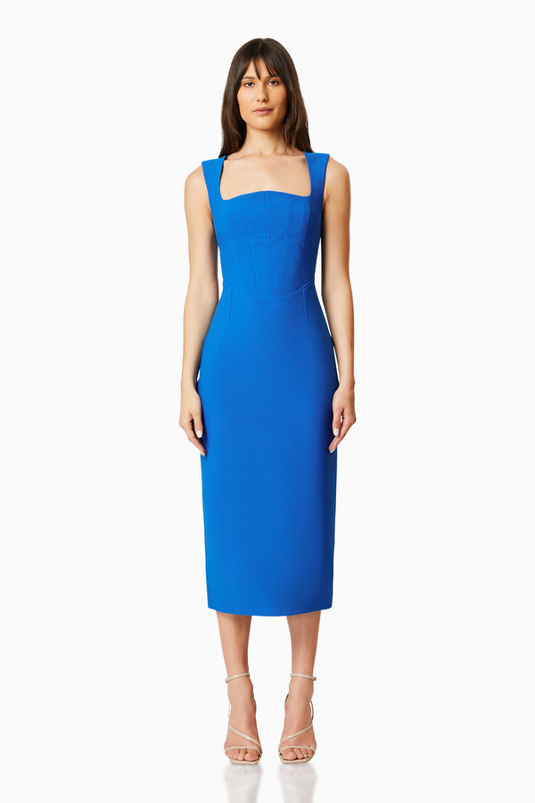 BROWN HAIR MODEL WEARING BIRCH FITTED MIDI DRESS IN COBALT FRONT SHOT