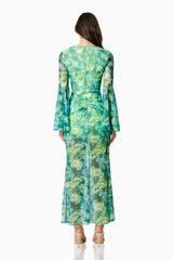 Brunette model wearing JONQUIL LONG SLEEVE MAXI DRESS IN GREEN back shot