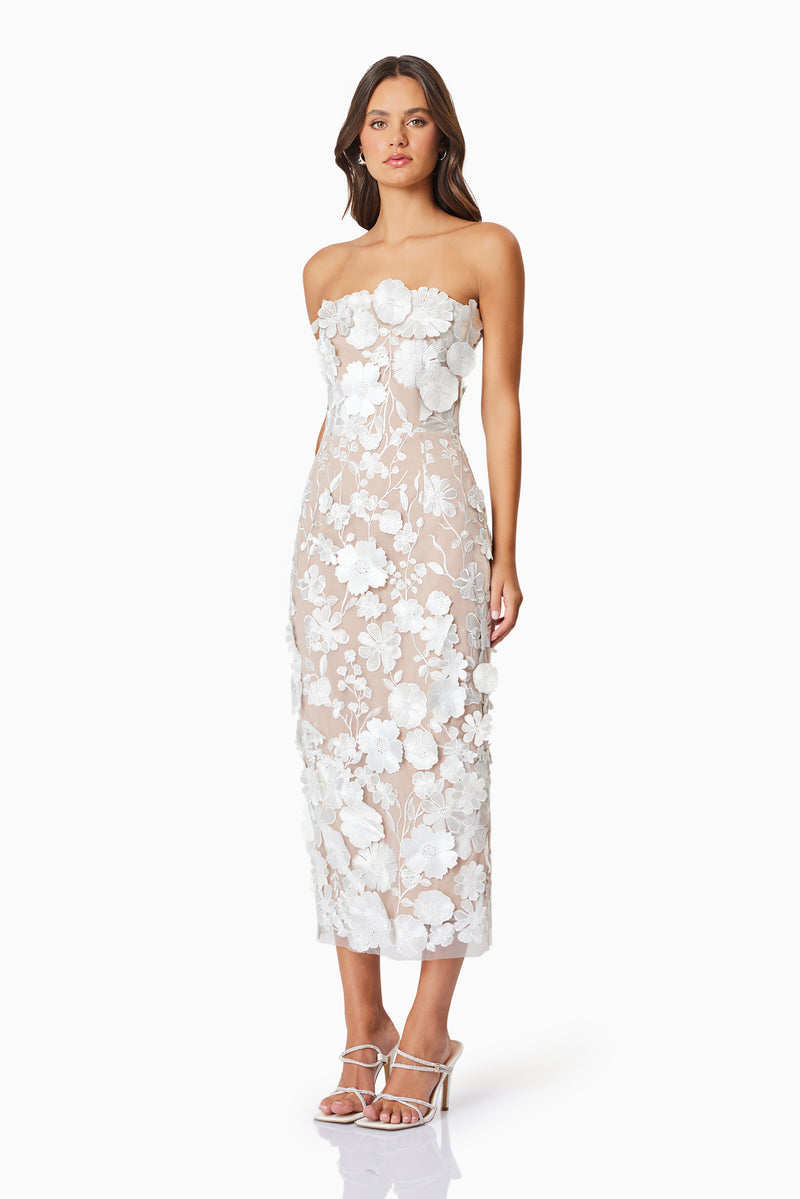 model wearing Helena floral midi dress in white side shot