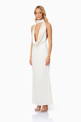 Blonde hair model wearing Faith Deep Neckline Maxi Dress In White side shot