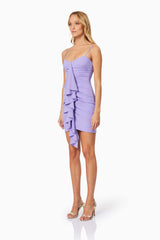 BLONDE HAIR MODEL WEARING JADE V NECK FITTED PARTY MINI DRESS IN LAVENDER SIDE SHOT