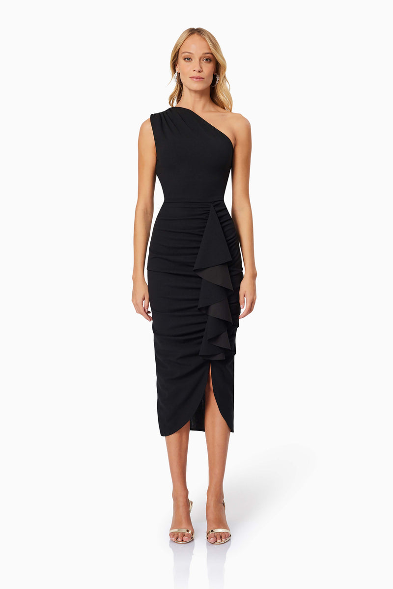 BLONDE HAIR MODEL WEARING JADE ONE SHOULDER MIDI DRESS IN BLACK FRONT SHOT