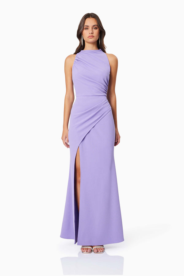 BROWN HAIR MODEL WEARING JADE HIGH NECKLINE FITTED MAXI DRESS IN LAVENDER FRONT SHOT