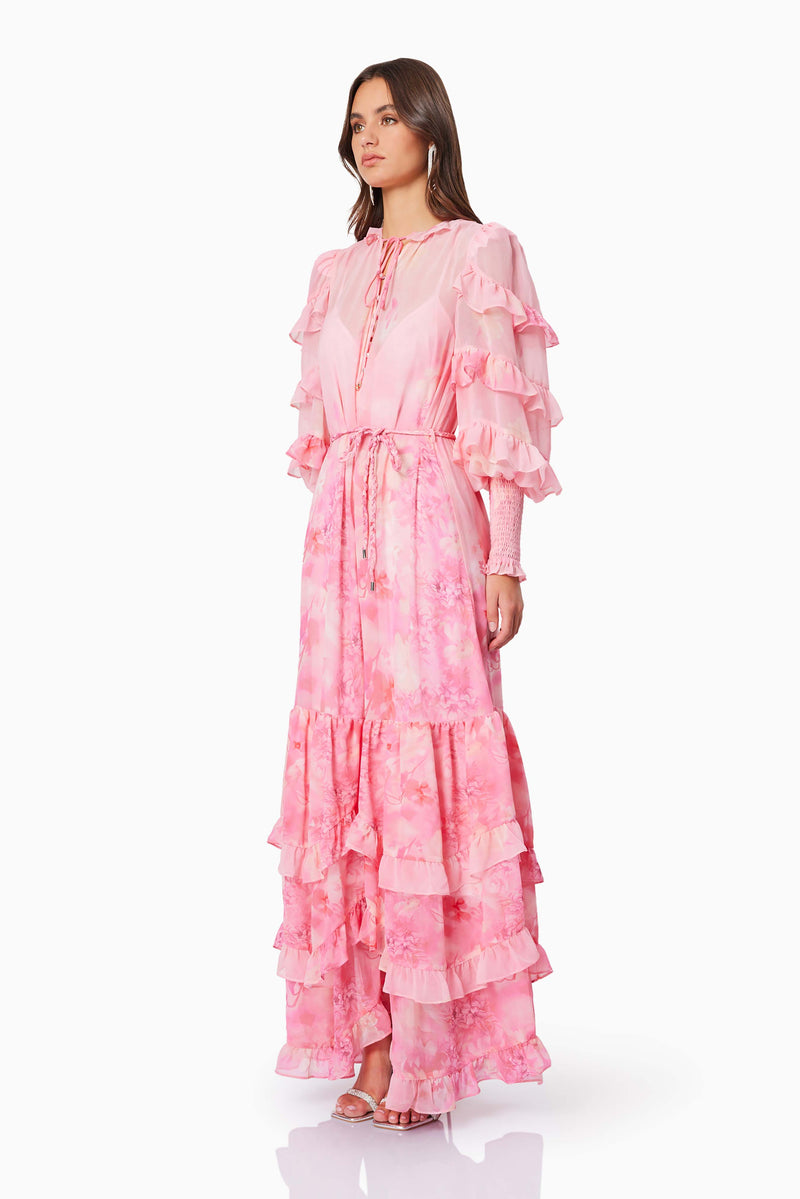 Brunette model wearing Ivy Maxi Dress in Pink side shot