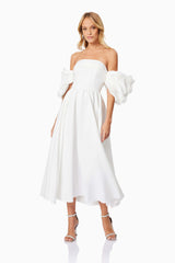 Blonde model wearing Destiny Off Shoulder Midi Dress in White front shot