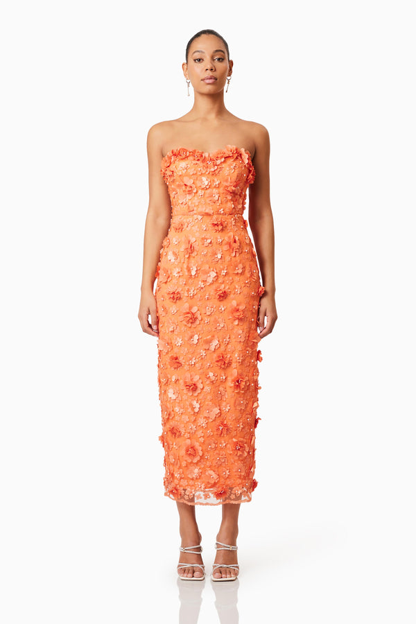 Brunette model wearing Bluebell 3D Midi Dress in Orange front shot