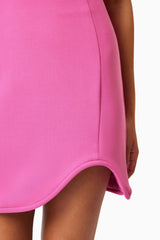 Brunette model wearing Janelle Strapless Mini Dress In Pink detail shot