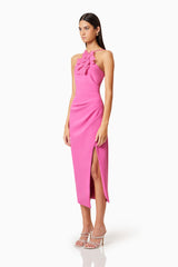 Brunette model wearing Janelle 3D Midi Dress In Pink side shot