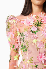 Brunette model wearing Aella Aline Floral Mini Dress In Pink detail shot