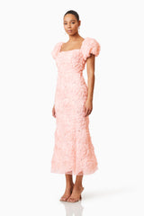 Brunette model wearing Rosella 3D Midi Dress in Pink side shot