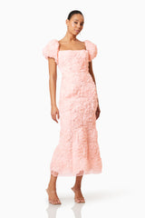 Brunette model wearing Rosella 3D Midi Dress in Pink posed shot