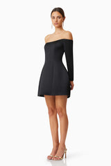 model wearing Vida Off The Shoulder Day Mini Dress In Black side shot