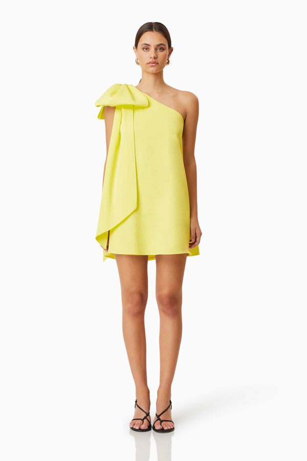 Model wearing Kennedy Party Mini Dress in Yellow Front Shot