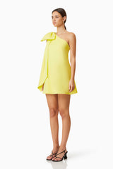 Model wearing Kennedy Party Mini Dress in Yellow Side Shot