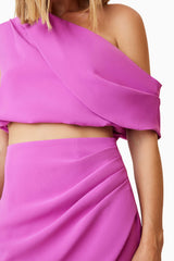 Blonde model is wearing Kenna Two Piece Set In Purple close up shot