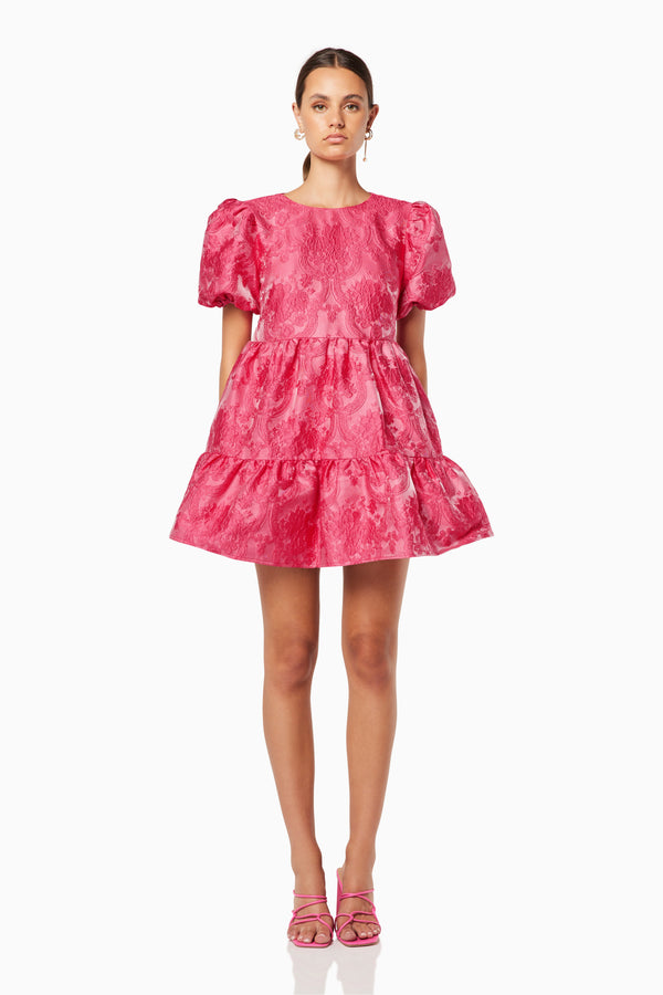 model wearing Wylla mini ruffled pink dress front shot