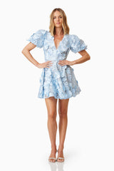 model wearing Selene Floral Mini Dress In Blue front shot