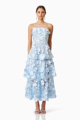 Brunette model wears Selene Maxi 3D floral Dress In Blue in heels front shot 