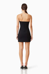 model wearing Sonnet Mini Strapless Pearl Dress In Black back shot