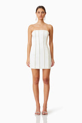 Sonnet Mini Strapless Pearl Dress In White with silver heels front shot 