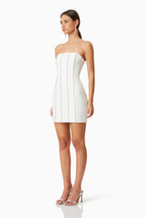 Sonnet Mini Strapless Pearl Dress In White with silver heels side shot 