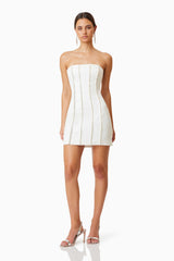 Sonnet Mini Strapless Pearl Dress In White with silver heels front shot 