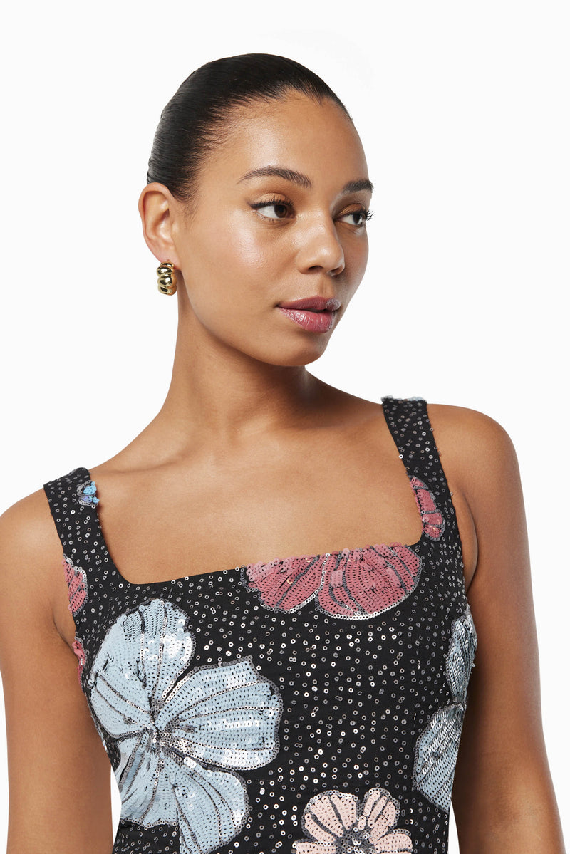model wearing Lou sequin floral mini dress in multi close up shot