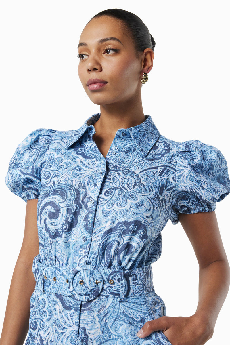 Model wearing ELOWEN PRINTED LINEN PLAYSUIT IN BLUE close up front shot