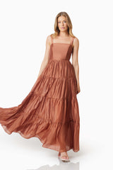 model wearing Fauna Resortwear Maxi Dress In Brown front shot