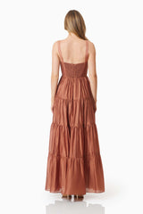 model wearing Fauna Resortwear Maxi Dress In Brown back shot