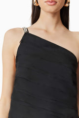 Brunette model wearing Eira One Shoulder Mini Dress in Black detail shot 