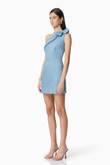 Brunette model wearing Celia Mini Asymmetrical Dress in Blue side shot