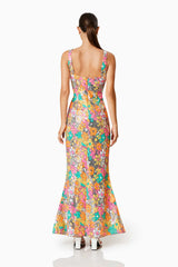Brown hair model wearing TIKI FITTED MAXI DRESS IN MULTI back shot
